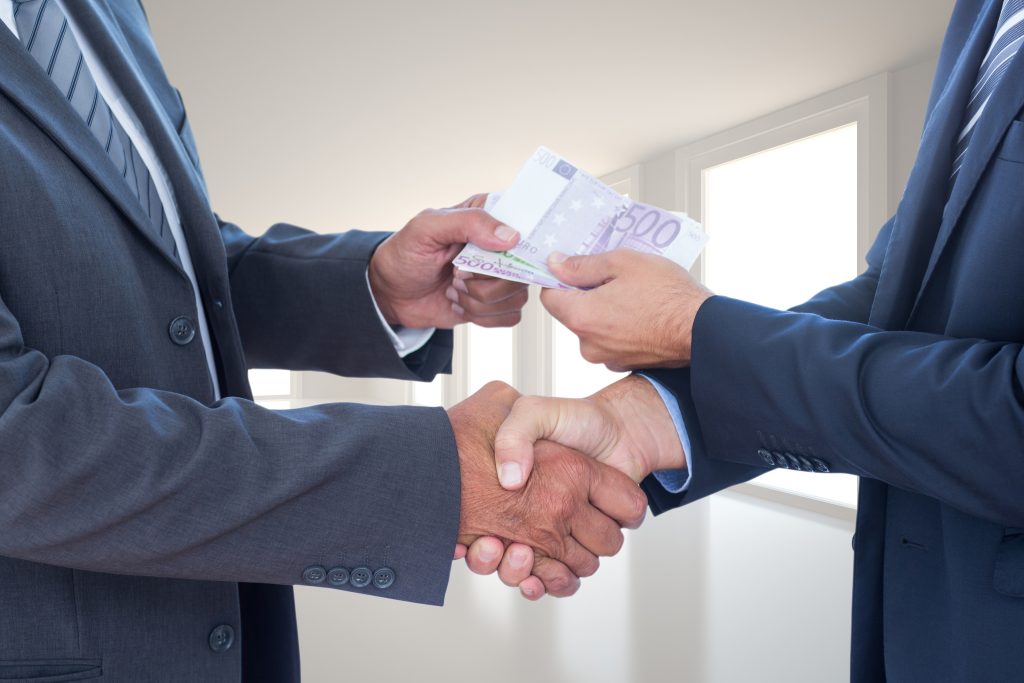 businessmen with bills scaled